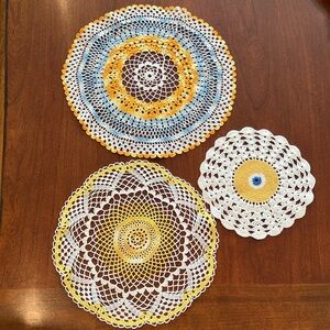 Lot of 3 vintage crocheted doilies, circular, white, yellow, orange, blue
